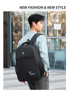 Detail view of black oxford backpack with functional zip pockets and mesh side compartments