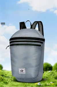 Detail of grey lightweight nylon folding backpack with breathable mesh shoulder straps