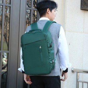 Sac à dos de voyage vert léger pour femme avec grande capacité et tissu imperméable