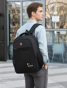 Business casual black Oxford backpack shown on model with urban city background