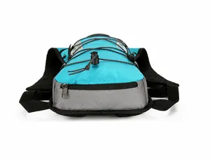 Detail view of the durable bottom zipper compartment and mesh straps on this blue cycling pack