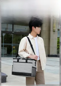 Sac isotherme gris en tissu Oxford avec bandoulière réglable et poche filet pour pique-nique