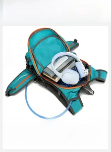 Detail of outdoor hiking backpack showing internal storage for iPad and hydration system