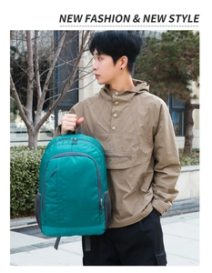 Detailed view of teal outdoor backpack with durable side mesh pocket and side zipper