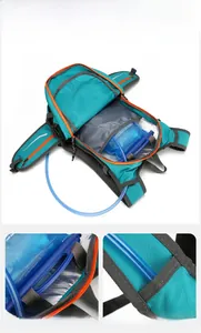 Detail of hydration backpack with internal velcro strap and shoulder water outlet port