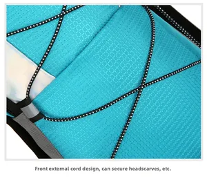 Close-up of hiking backpack bungee cord and tear-resistant honeycomb mesh texture
