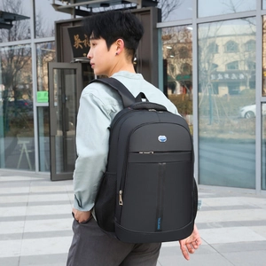 Men's large business travel backpack in black with water-resistant fabric and side pockets