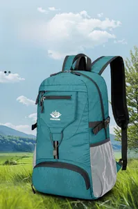 Sac à dos de randonnée bleu sarcelle déperlant avec logo de montagne et sangle réglable