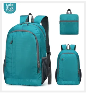 Detail of lake blue foldable outdoor backpack showing compact storage and ripstop fabric