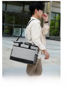 Sac isotherme en tissu oxford gris avec poche filet et bandoulière réglable pour le déjeuner