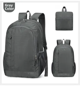 Close-up of lightweight grey outdoor backpack with foldable design and ripstop texture