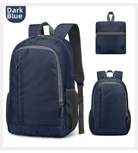 Detail of dark blue foldable lightweight outdoor backpack with waterproof nylon texture