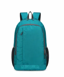 Detailed front view of teal outdoor backpack showing ripstop texture and mesh side pockets