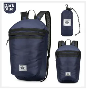 Detail view of foldable dark blue outdoor backpack in both open and compact storage states