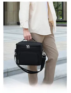 Détail du sac isotherme noir en tissu oxford avec double fermeture éclair et bandoulière