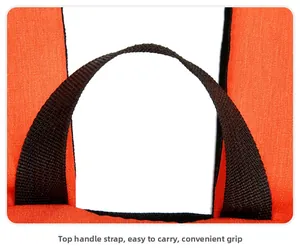 Detail des oberen Tragegriffs am orangefarbenen Rucksack mit verstärkten Nähten