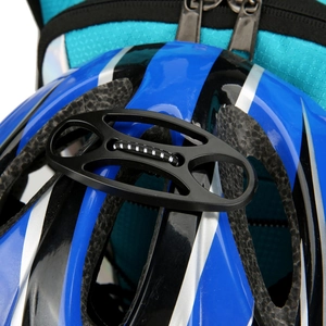 Blue outdoor sports backpack featuring a convenient attachment clip for a cycling helmet
