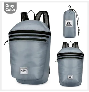 Macro shot of grey foldable backpack with breathable mesh straps and storage pouch