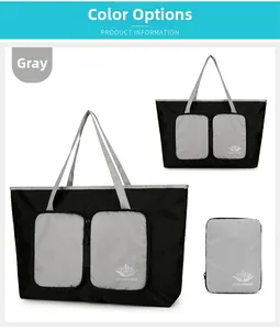 Sac de voyage pliable noir avec sangles grises montrant l'état déplié et compacté