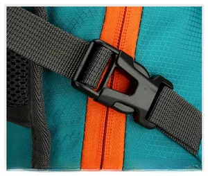 Detailed close-up of high-quality buckle and tear-resistant nylon fabric on hiking backpack