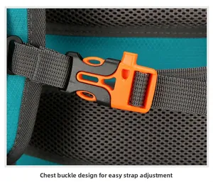 Detailed close-up of orange emergency whistle buckle and chest straps on hiking backpack