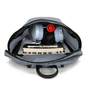 Foldable light blue outdoor backpack with large capacity showing internal storage items