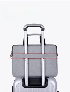 Grey laptop sleeve with back strap for suitcase luggage attachment for business travel