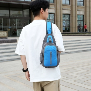 Water-resistant blue nylon crossbody sling bag for outdoor sports and travel hiking