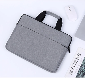 Detailed top view of grey waterproof oxford fabric laptop bag with black handles and side pocket