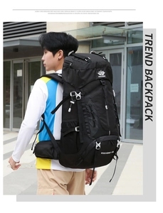 Side view of a 60L black hiking backpack showing mesh pockets and padded waist straps
