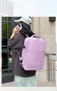 Lavender travel backpack for women featuring an integrated USB charging port and side buckle