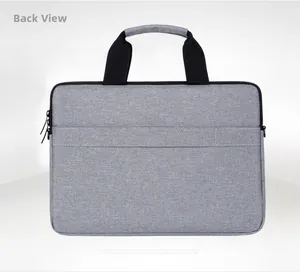 Back view of gray laptop bag showing the luggage strap for easy travel attachment