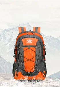 Detail of waterproof nylon fabric on orange hiking backpack showing water resistance