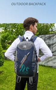 Detail of 40L outdoor hiking backpack in blue nylon with ergonomic padded straps