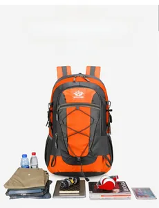 Detail view of hiking backpack showing large capacity with clothes and gadgets