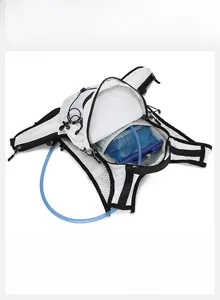 Detail view of large capacity hydration vest backpack showing internal storage compartments