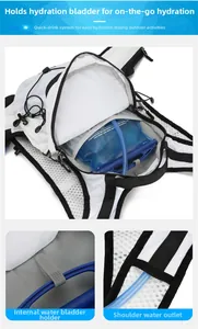 Detail of white hydration vest showing water bladder compartment and shoulder hose outlet