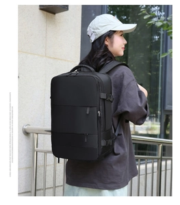 Close-up of waterproof nylon travel backpack with multi-layer zippers and buckles