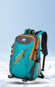 Detail view of the 40L blue hiking backpack with orange zippers and breathable straps
