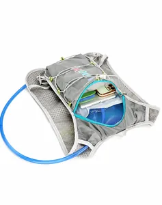 Detail view of the lightweight hydration vest showing multiple storage compartments