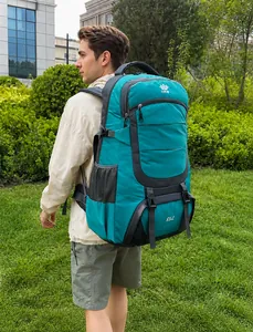 Close-up of 85L green outdoor hiking backpack with multi-layer pockets on a male model