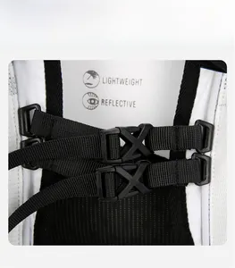 Detail of adjustable chest straps with lightweight and reflective buckle system on sports vest