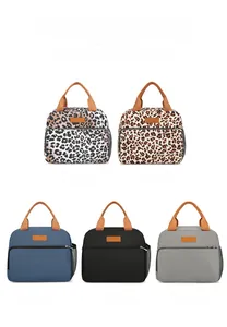 View of various stylish portable lunch bags in leopard patterns and solid colors