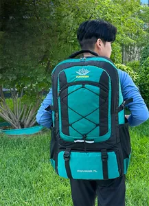 Detail view of 75L outdoor hiking backpack with trekking pole attachments and side mesh pockets