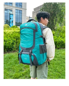 Close-up of 85L lake blue hiking backpack with nylon texture and adjustable buckles