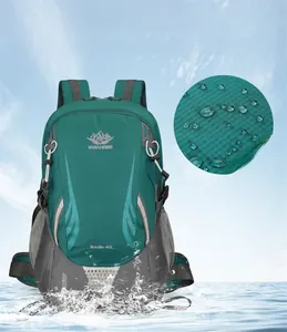 Detail showing high-density nylon waterproof fabric with water droplets on 45L hiking backpack