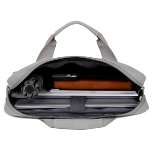 Grey minimalist laptop bag with organized interior compartments for business travel