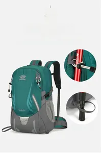 Detail view of 45L emerald green hiking backpack with trekking pole attachments