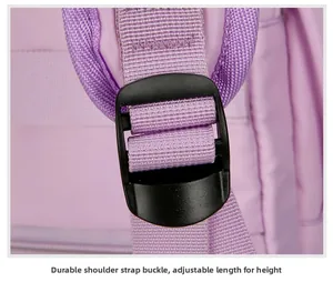Close-up of durable black plastic strap buckle and purple nylon webbing for adjustable fit
