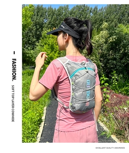Detail of grey running vest with elastic cord system and blue Outdoor logo